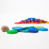 Botones de Colores Ensartables de Madera – Juguete Waldorf de Grimm’s